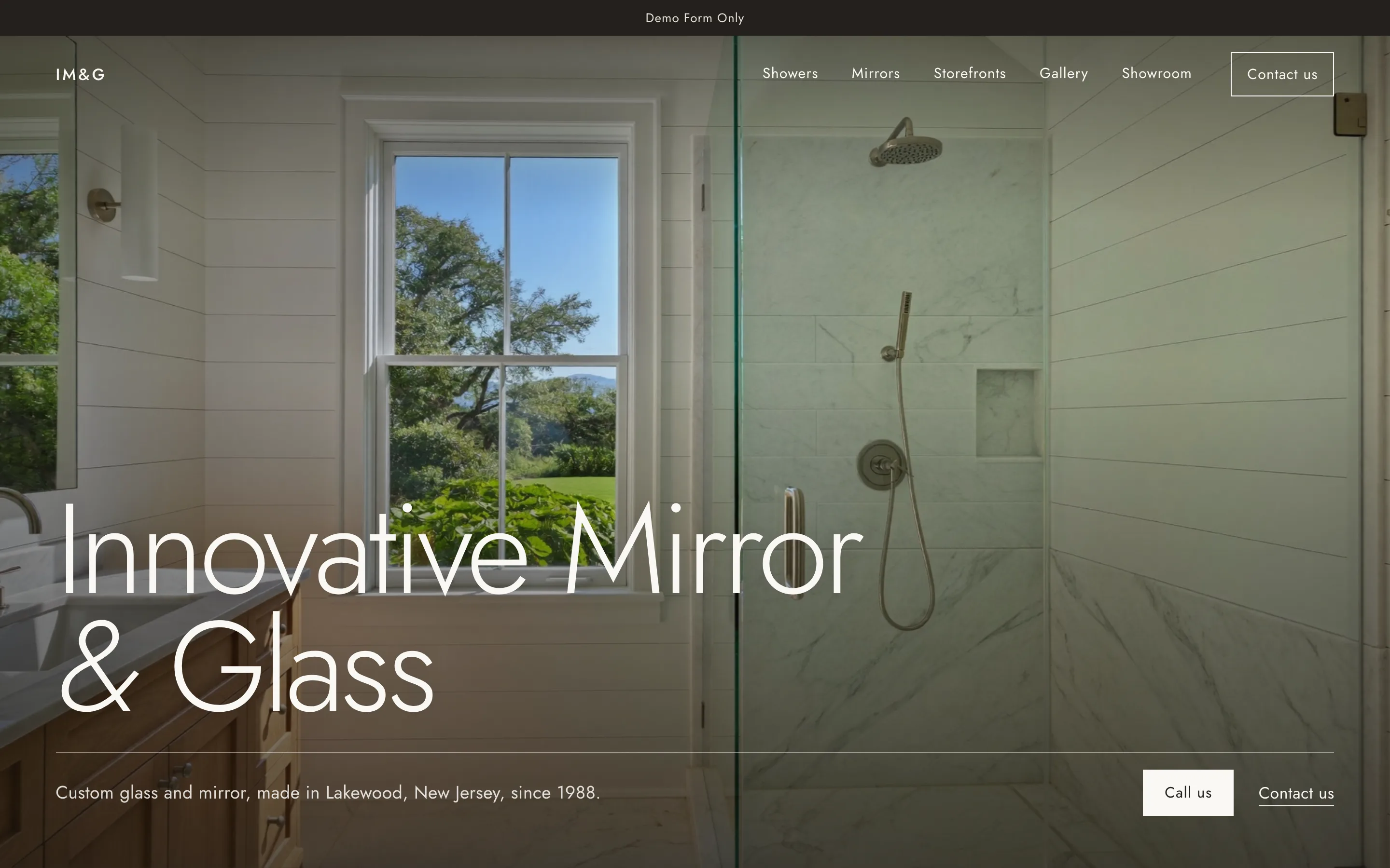 Innovative Mirror & Glass homepage: a frameless glass shower in a white bathroom with a garden window, with the company name in light type at lower left.